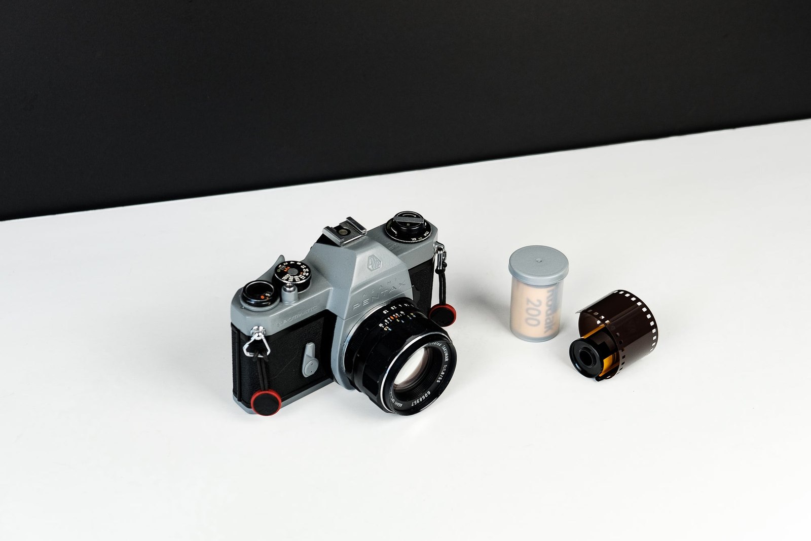 Vintage Camera And Film On Monochrome